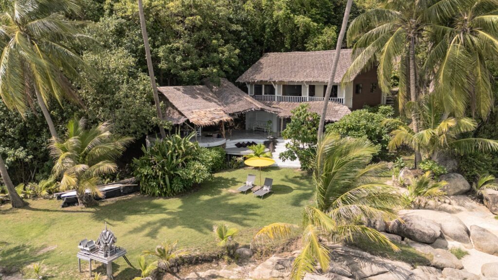 A SOWK Resort villa and its secluded beach in daylight